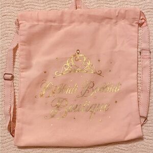 Disney Oink and Gold Shimmering Back Pack 
“Bibbidi Bobbidi Boutique”